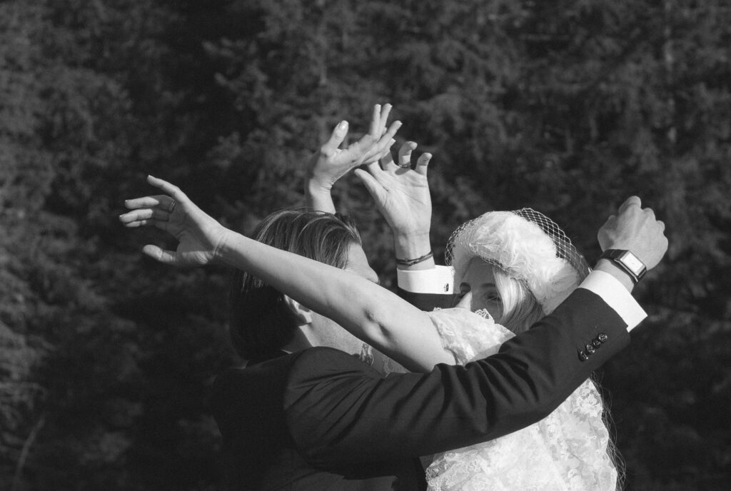 close up of the couple and their arms during the photo session in the mountains in megève