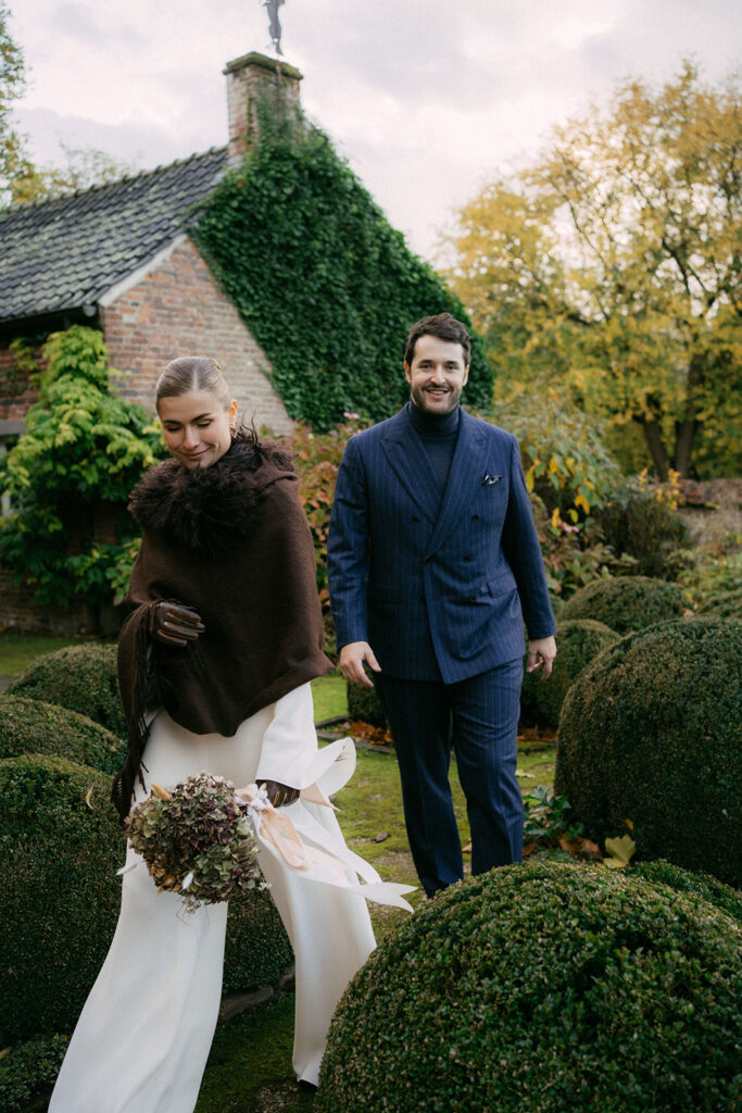 couple walking on the gardens at autumn
