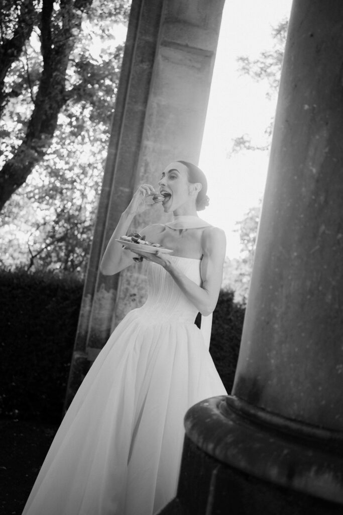 portrait of the bride testing the dessert