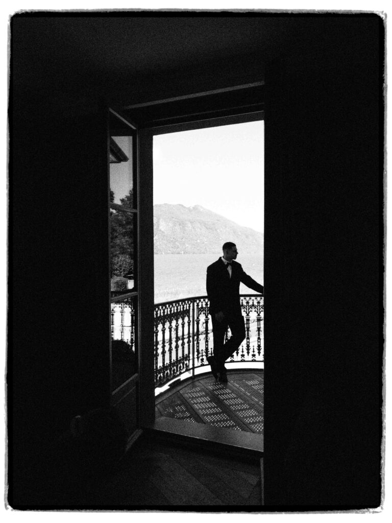 chateau de Tresserves by the lake du Bourget, groom watching the view from the balcony